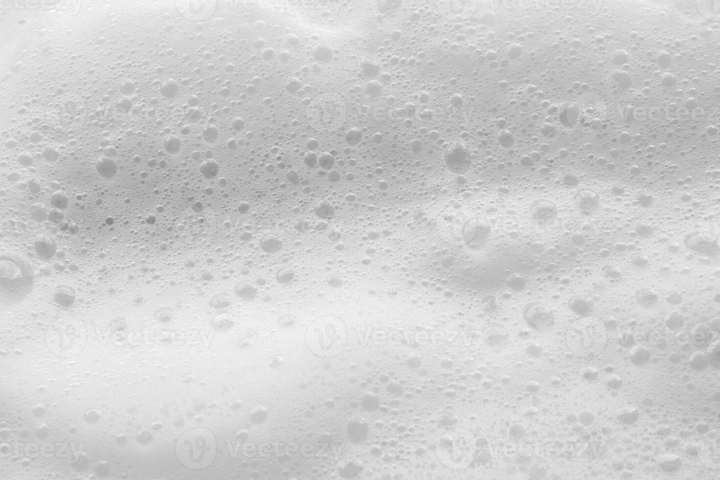 Abstract white soap foam bubbles texture background photo