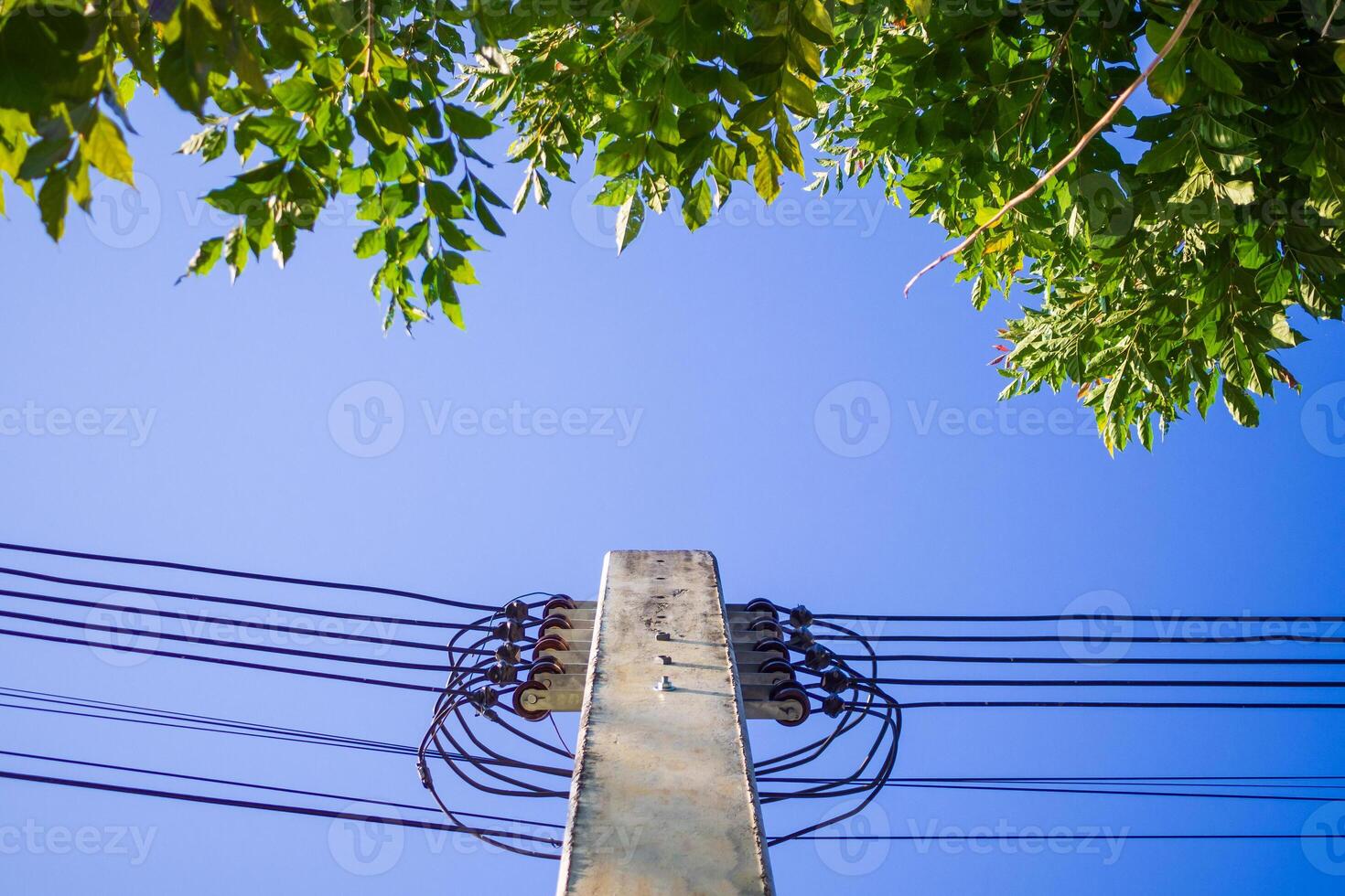 Electric power poles with power lines background photo