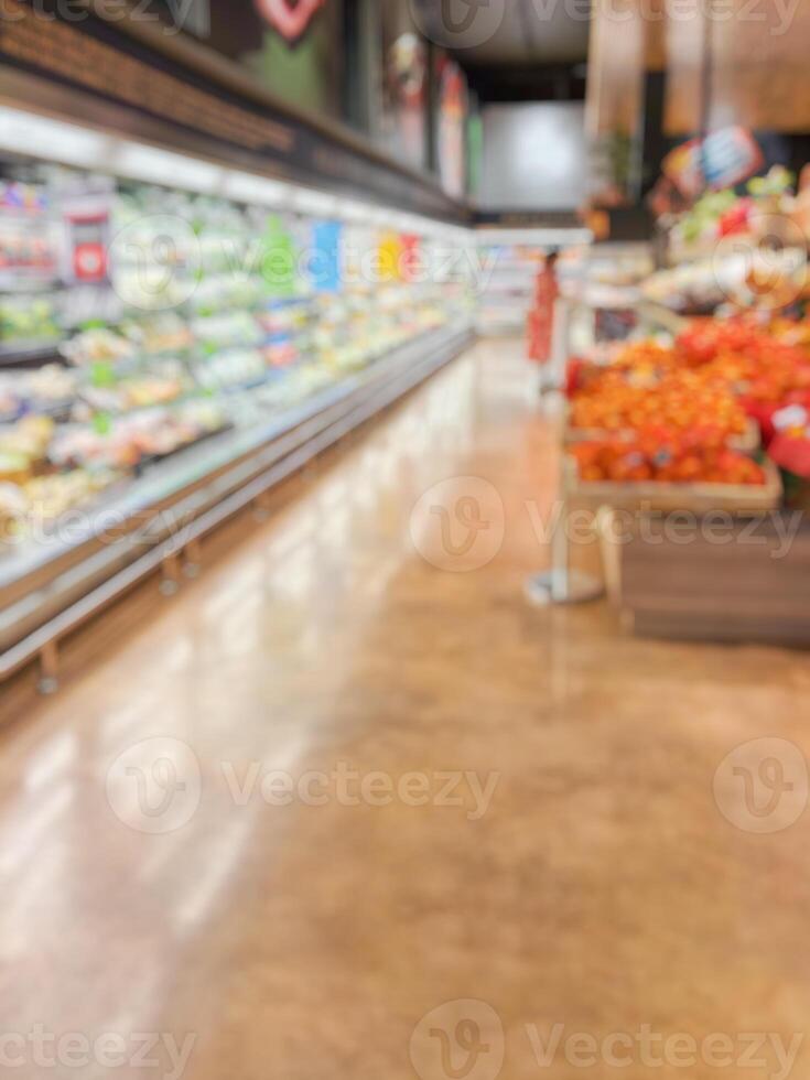 supermarket grocery store aisle and shelves blurred background photo