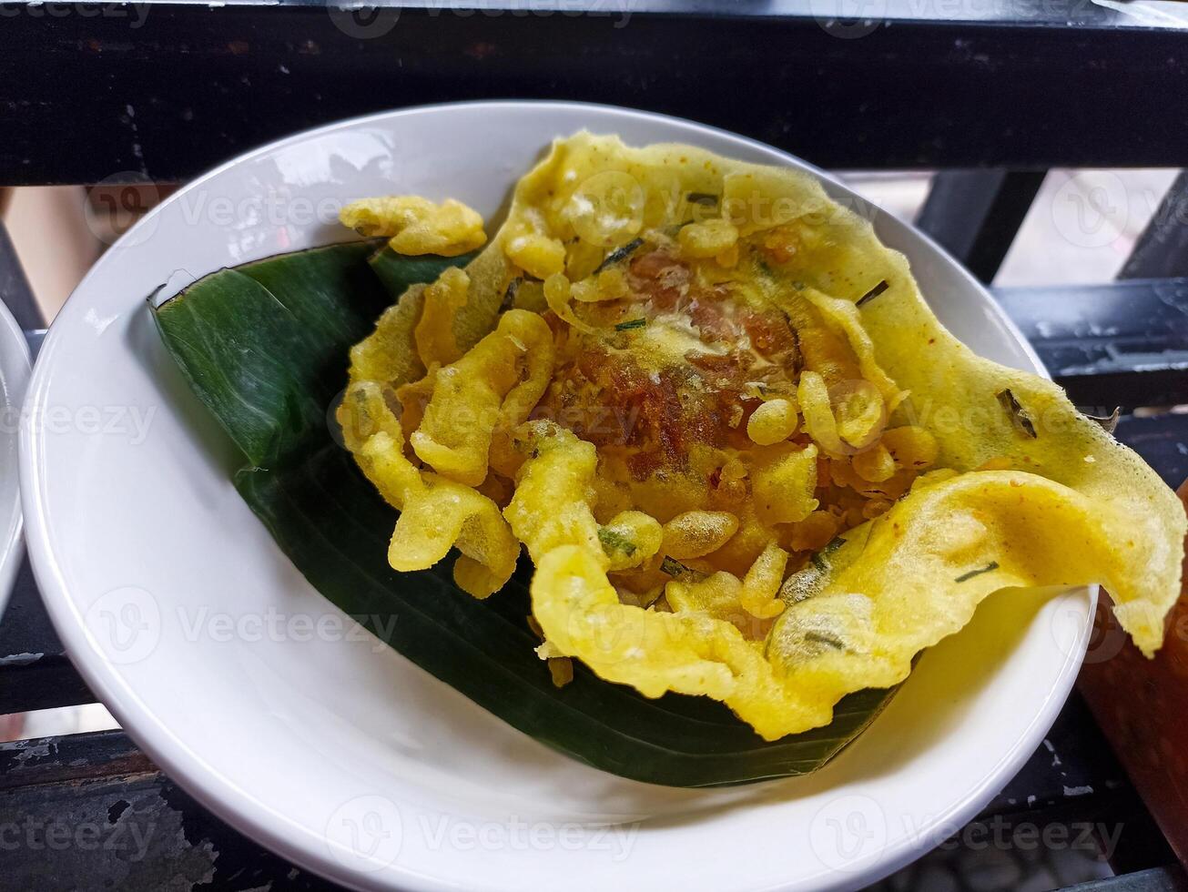 This food is called tempe kemul, a typical food from the city of Wonosobo which is made from soybean tempeh photo