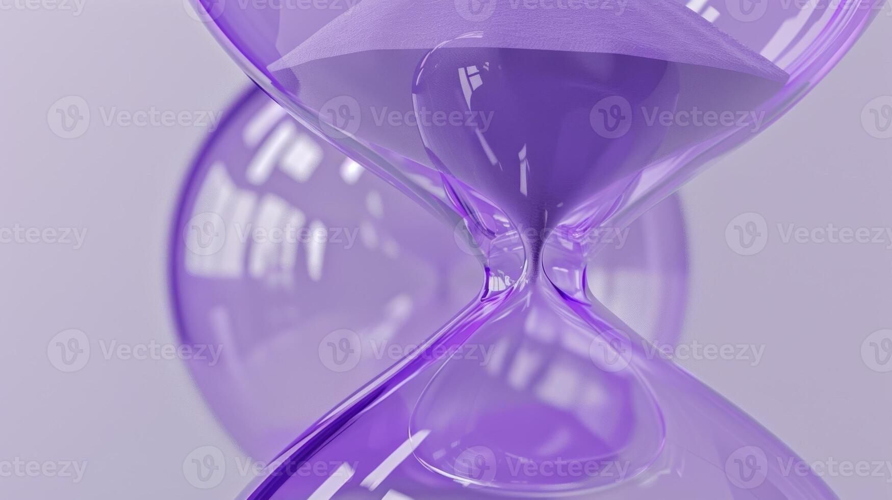 A purple inflatable 3D hourglass with a sandlike texture and curved edges representing the passing of time and the importance of making the most of it photo