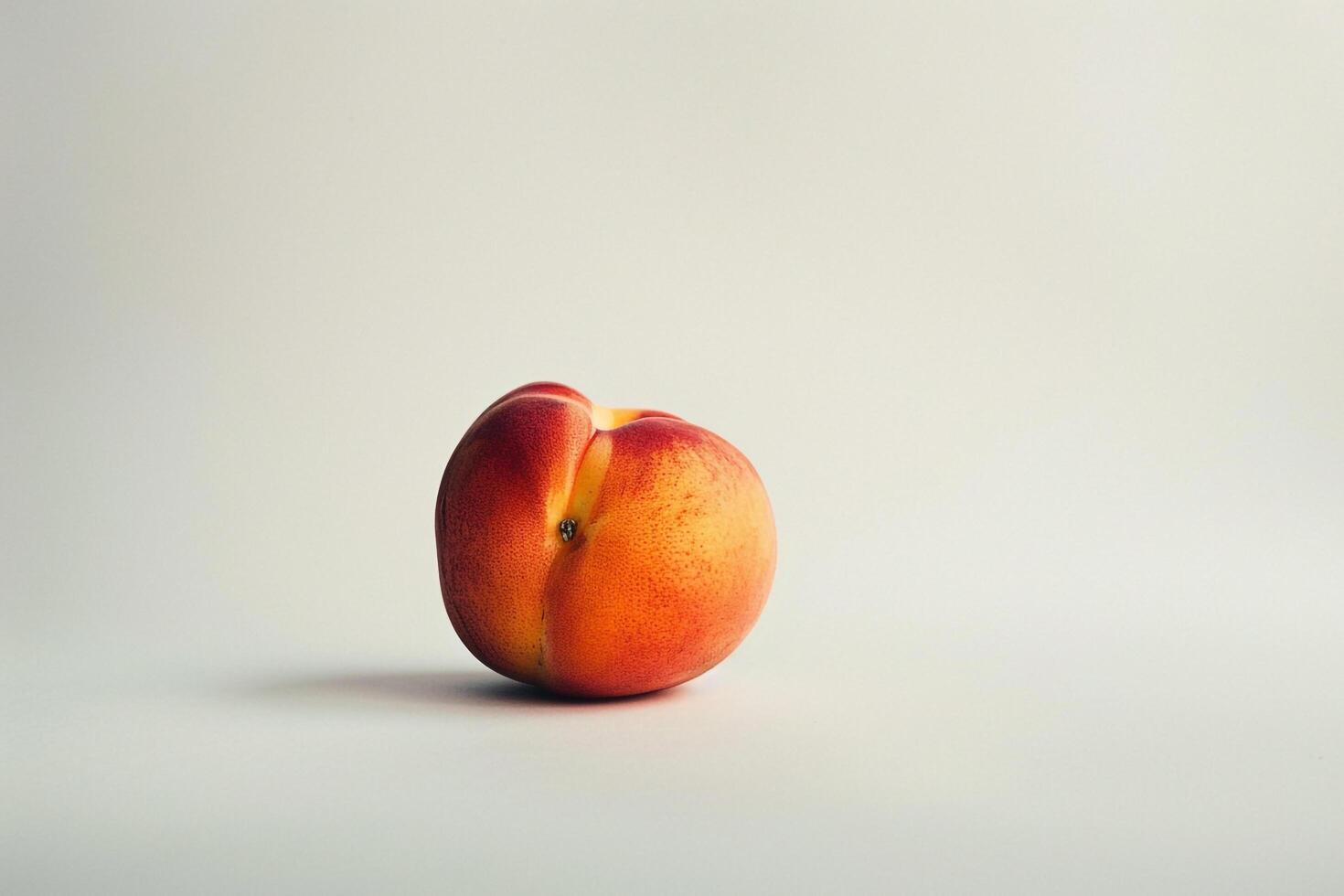 Single Peach on White Background photo