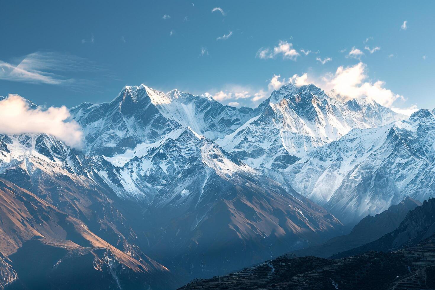 A Mountain Range with Snow Capped Peaks Background photo