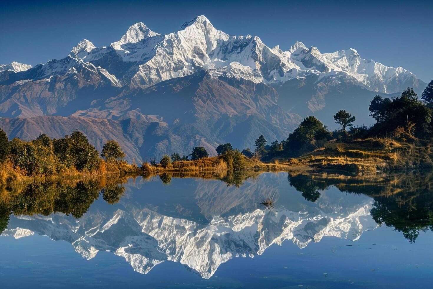 Snow Capped Mountains Reflected in the Water Background photo