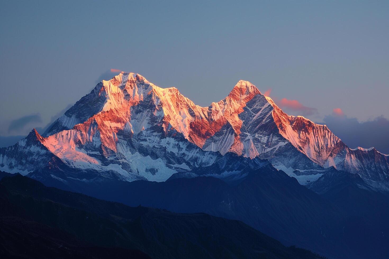 Sun Sets Over Snow Capped Mountains Background photo