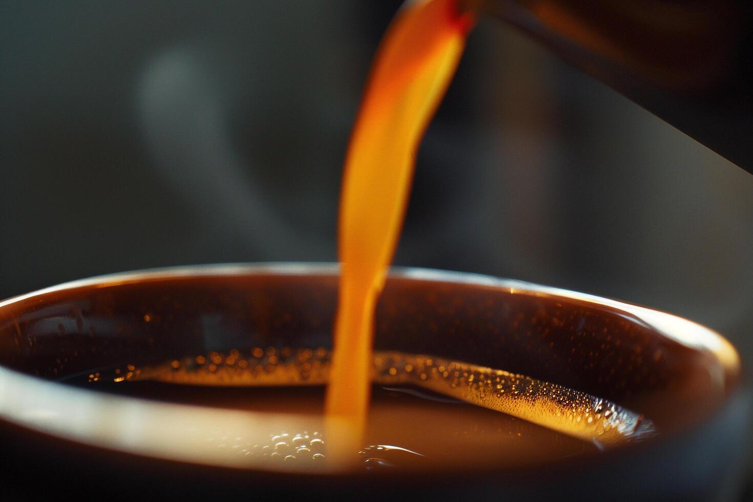 of a Cup of Coffee Being Poured photo