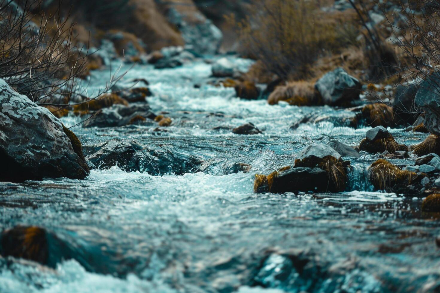 A Stream of Water Flowing through a Rocky River Background photo