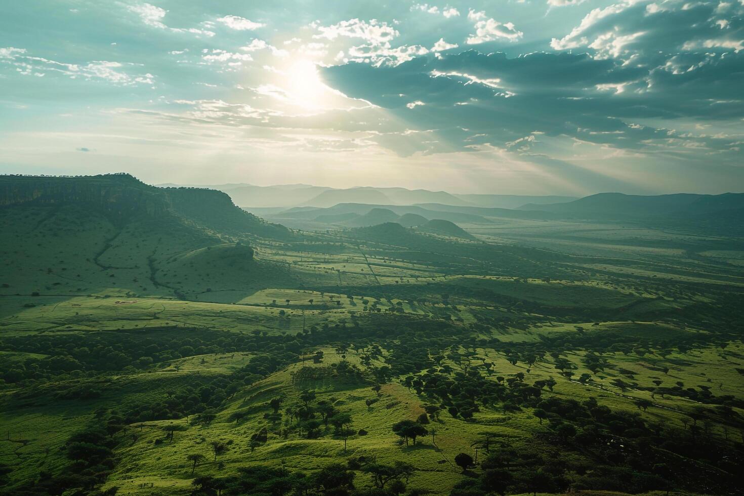 a view of a valley with a mountain in the background background photo