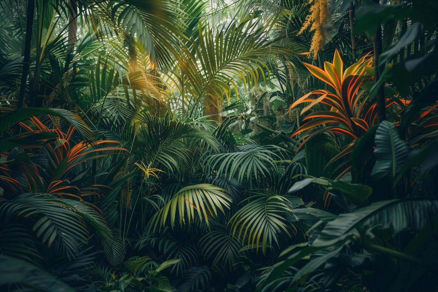 tropical jungle with green plants and palm trees background photo
