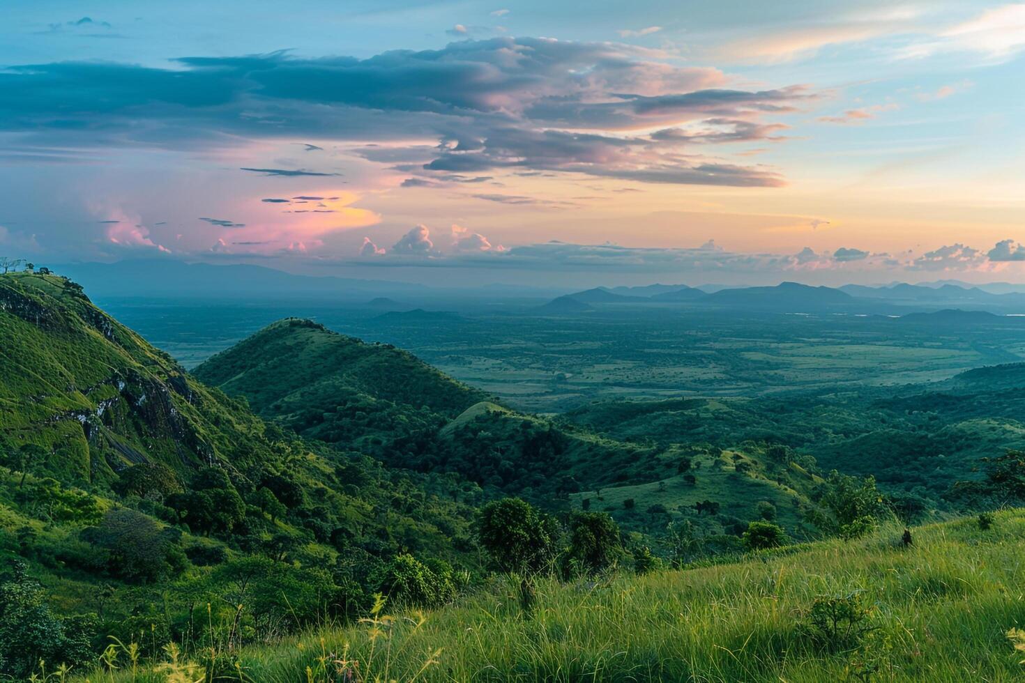 a view of a mountain range with a sunset background photo