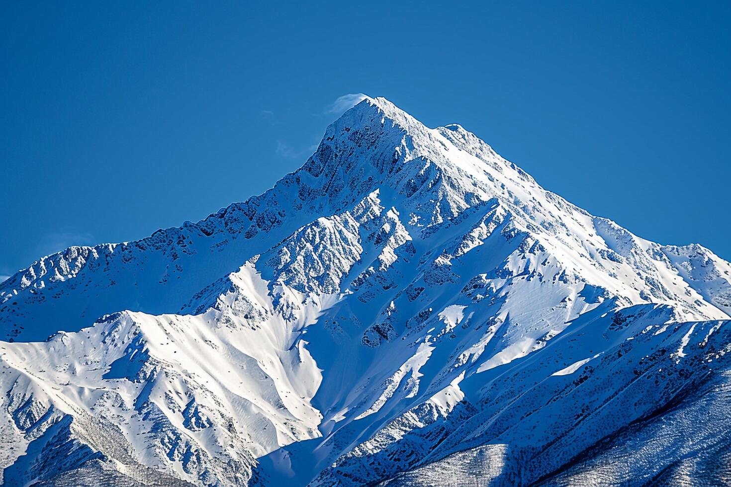 a mountain with snow on it background photo