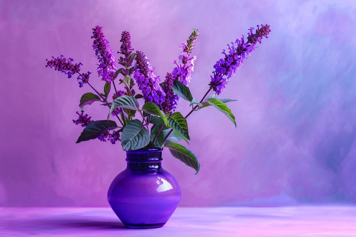 Purple flowers in a vase on a purple background photo