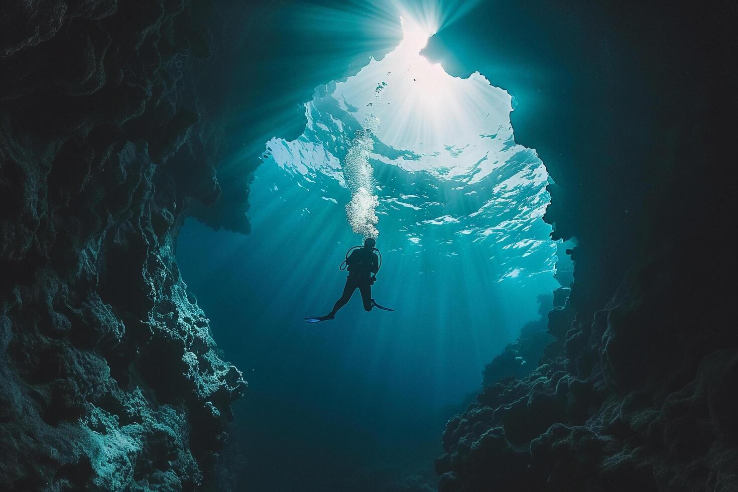 A Person Diving into a Cave with Sunlight Coming Through Background photo