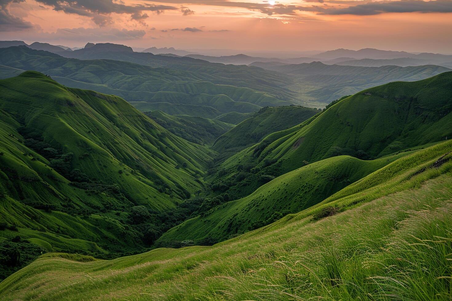 a view of a mountain range at sunset background photo