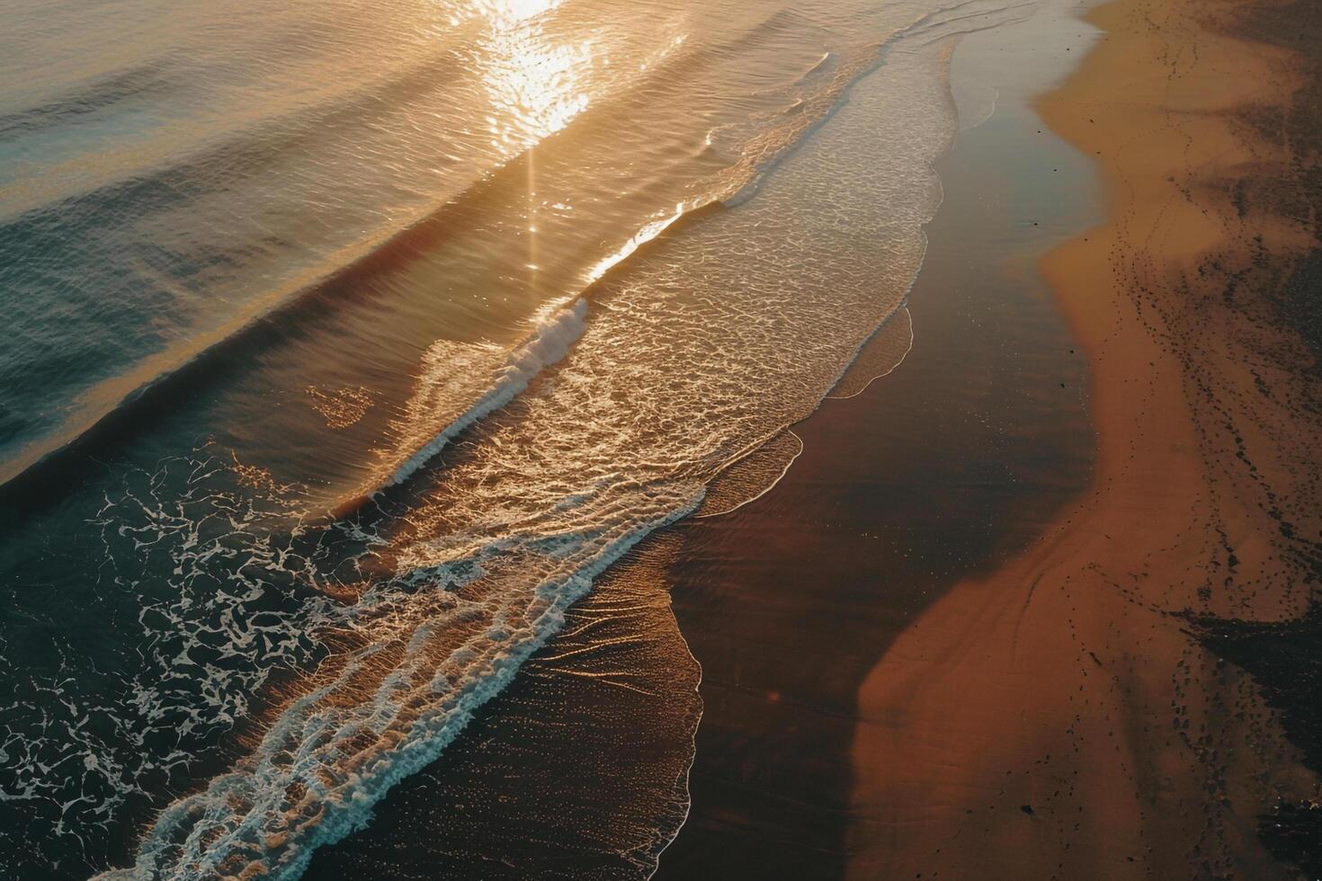 an aerial view of the ocean and beach at sunset background photo