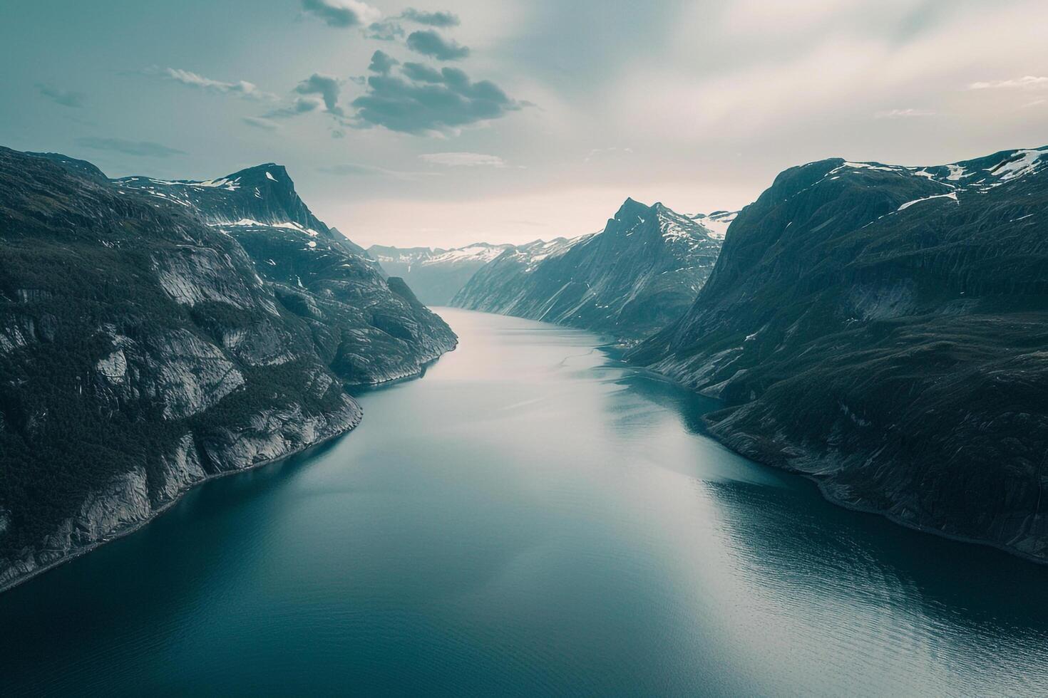 a beautiful view of a river and mountains background photo