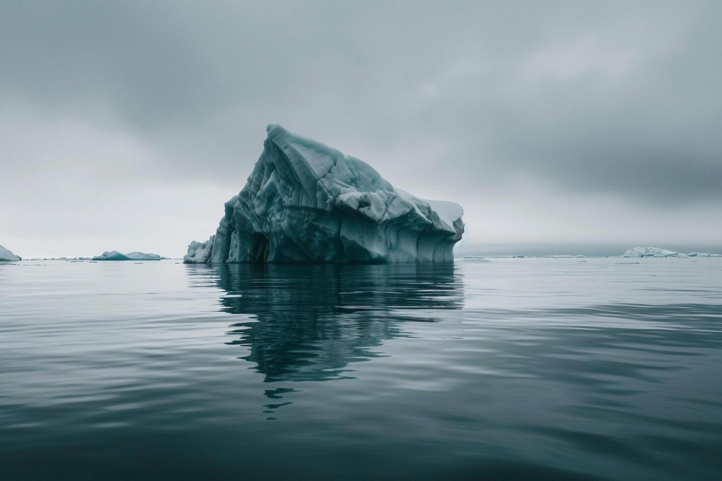 iceberg in the ocean with fog and clouds background photo