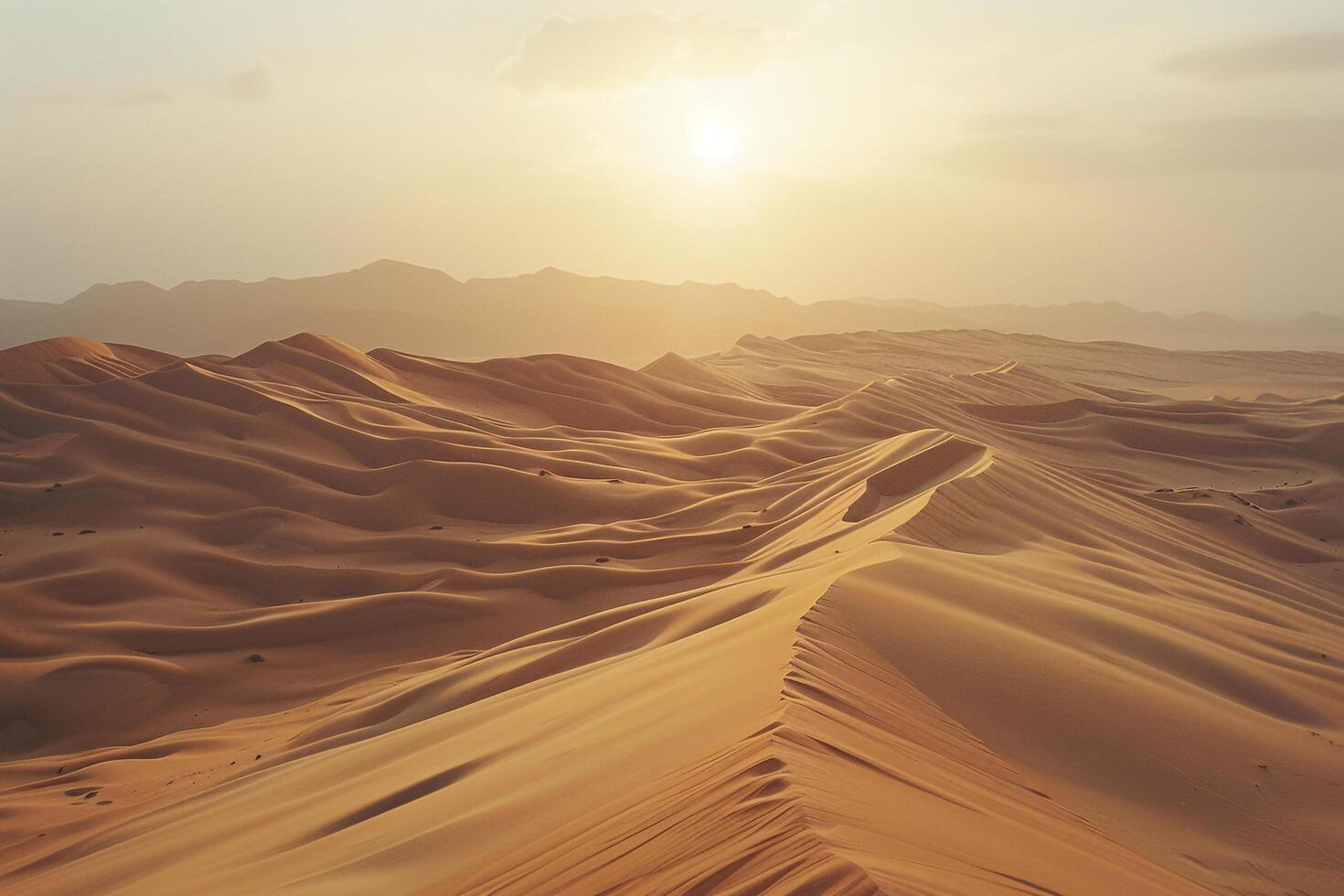 the sun is setting over a desert with sand dunes background photo