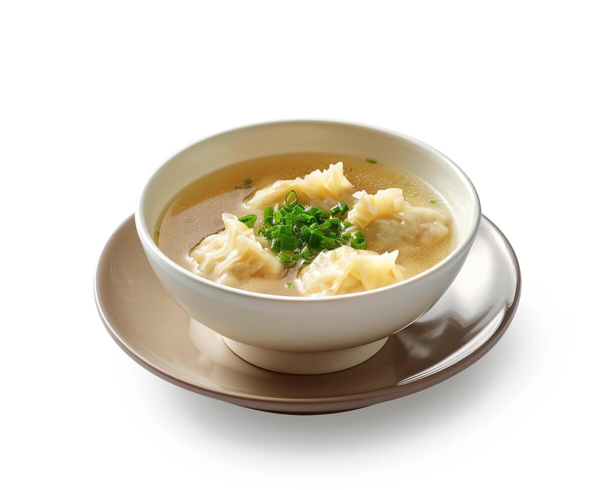 a bowl of soup with dumplings on a plate background photo