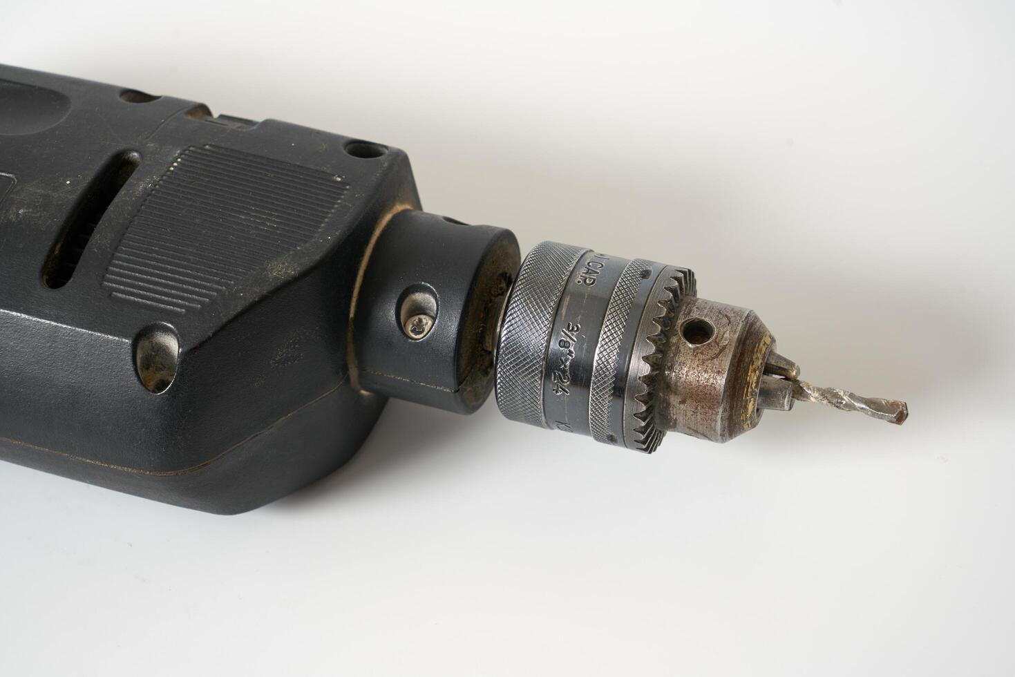 Vintage drill on a white back ground photo