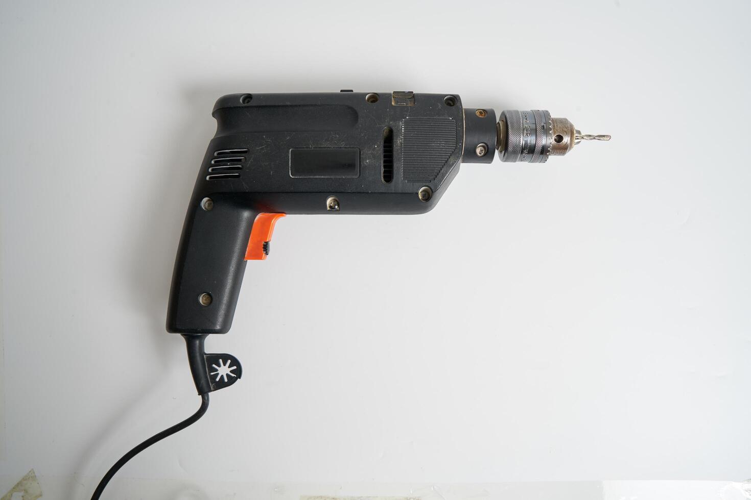 Vintage drill on a white back ground photo