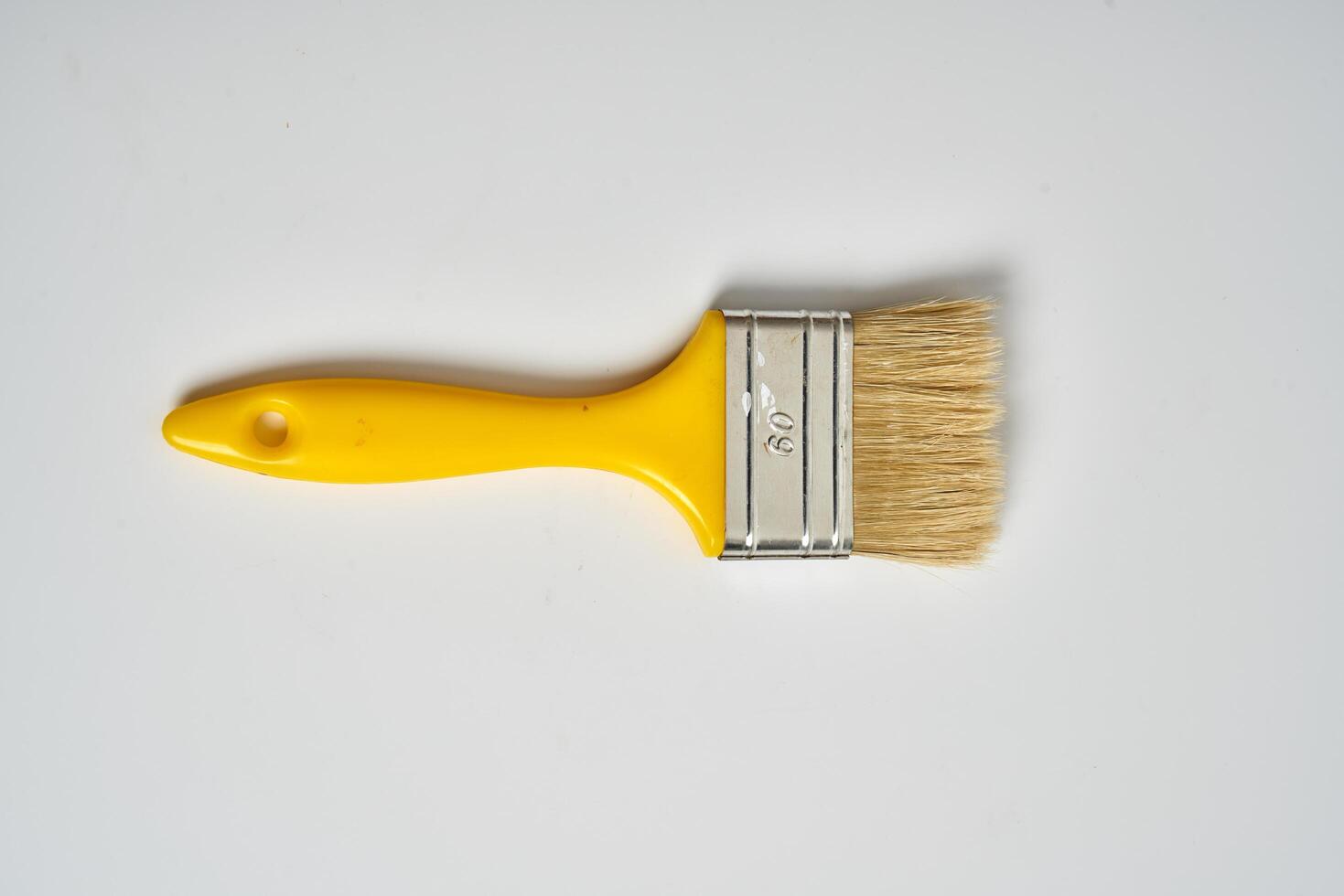 small paint brush on a white background photo