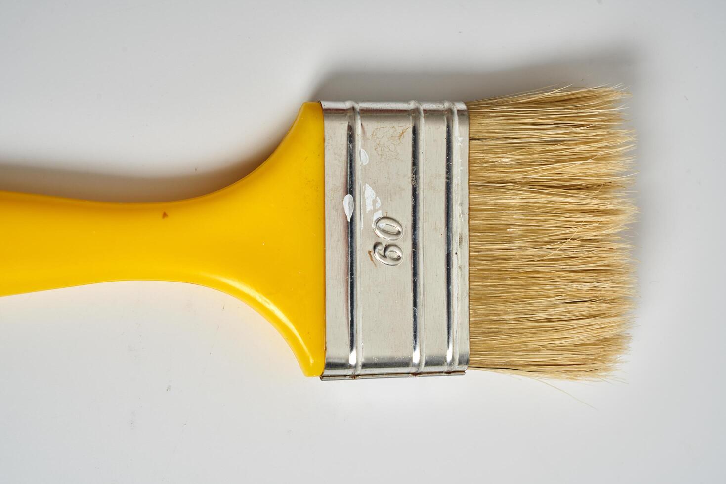 small paint brush on a white background photo