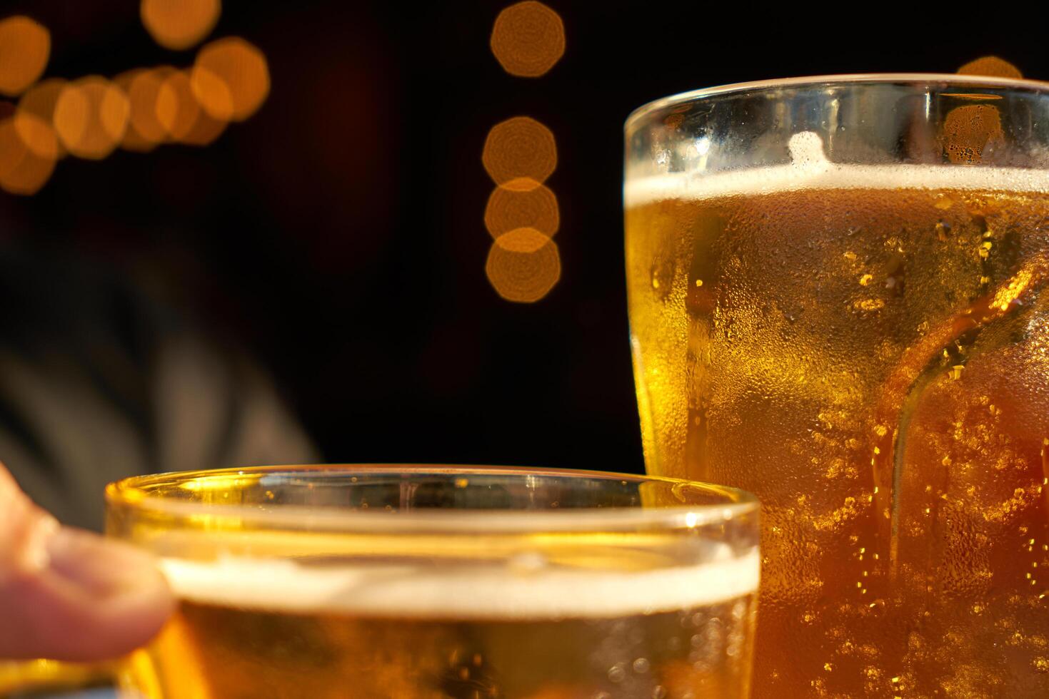 male hands holding beer photo