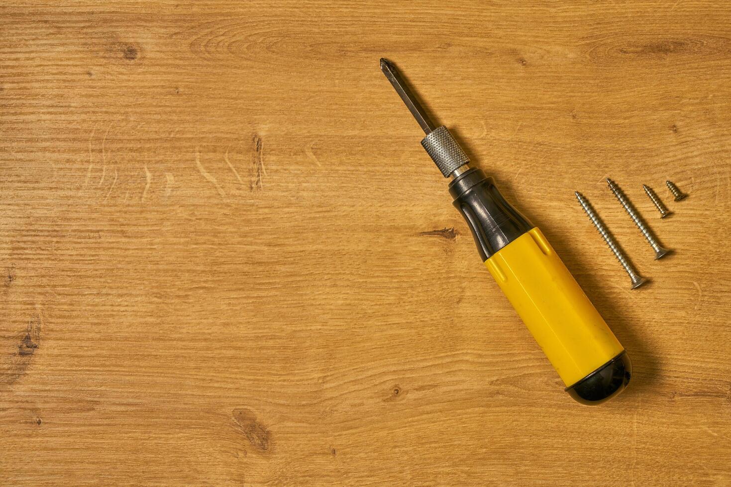 screw driver on a table photo