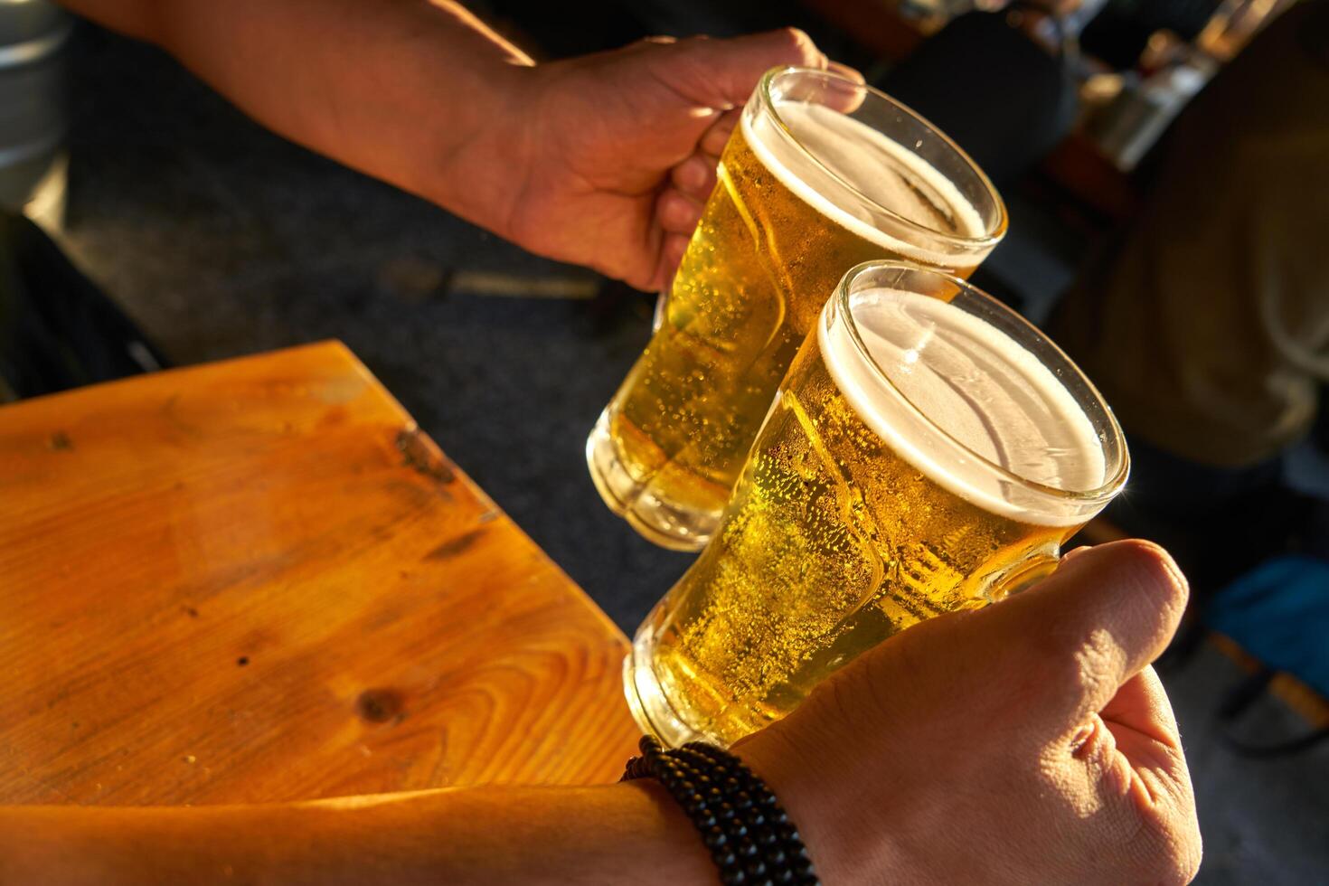 male hands holding beer photo