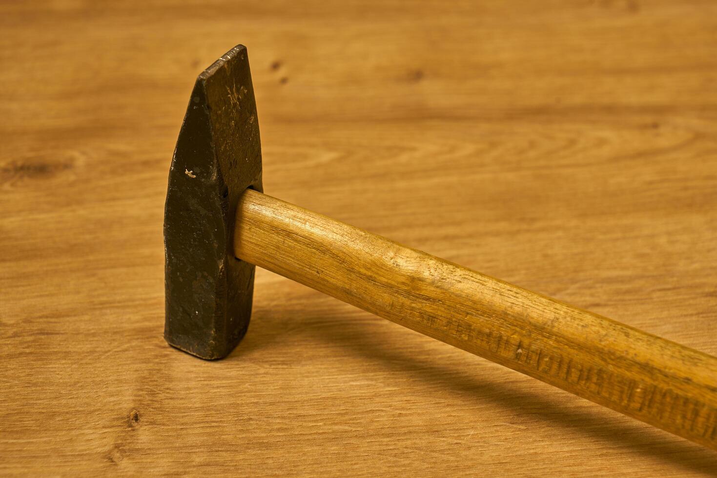 carpenters hammer on a table photo