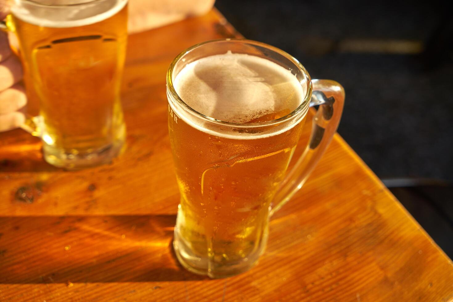 male hands holding beer photo