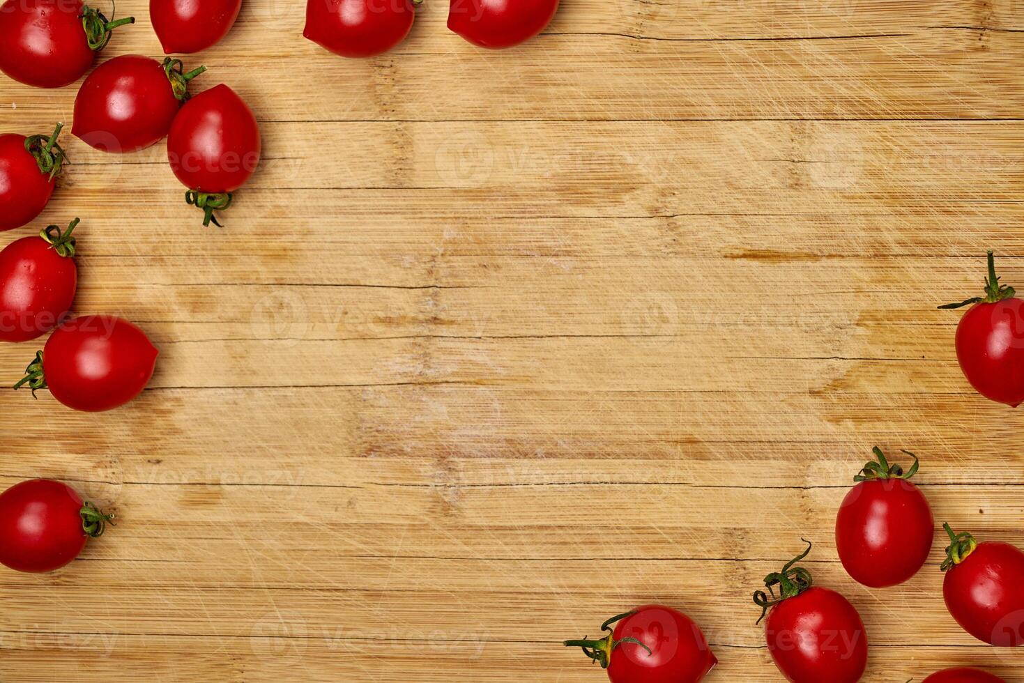 cherry tomatoes on a cutting board photo