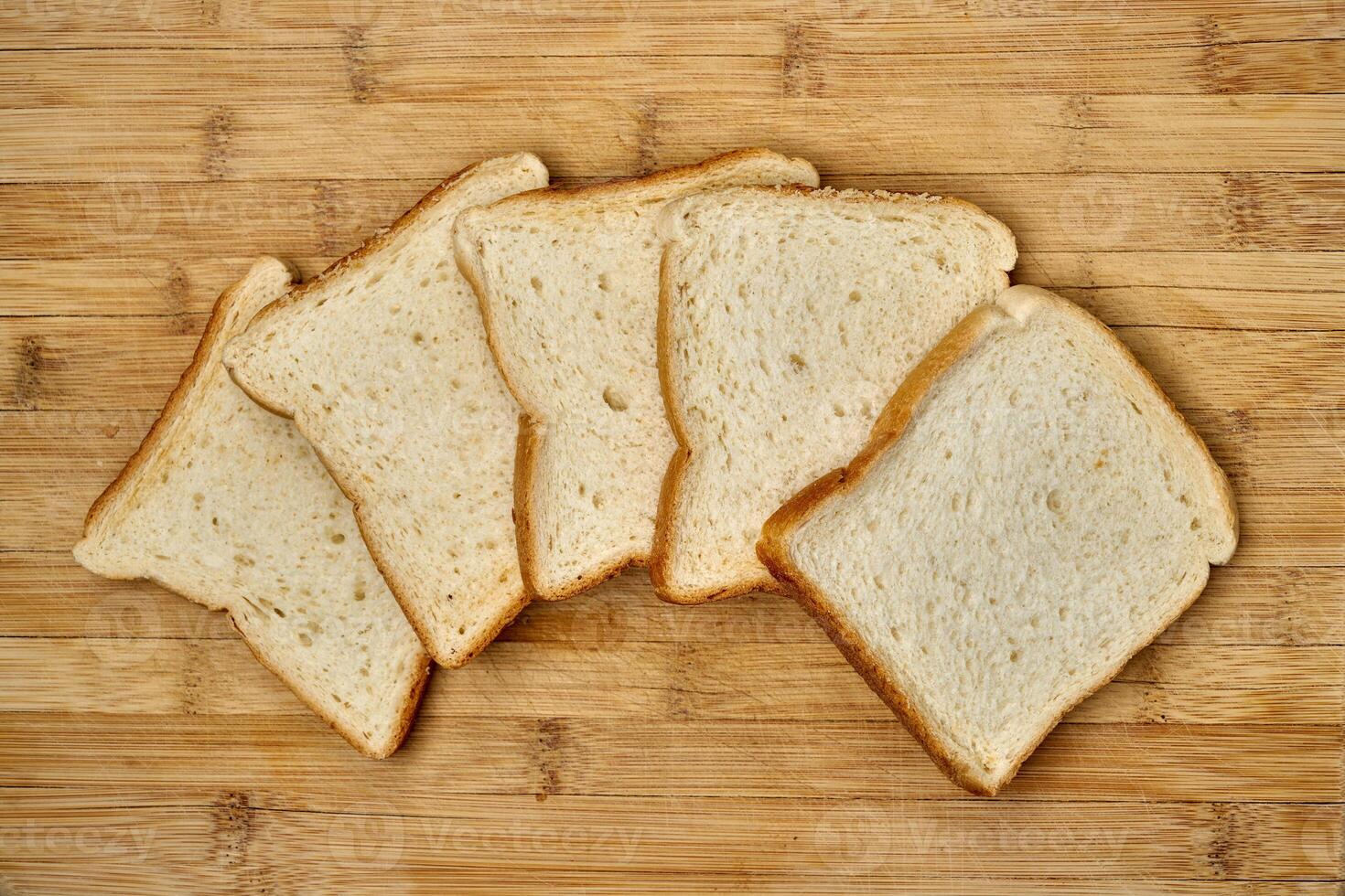 Slices of toast bread on a kitchen counter photo