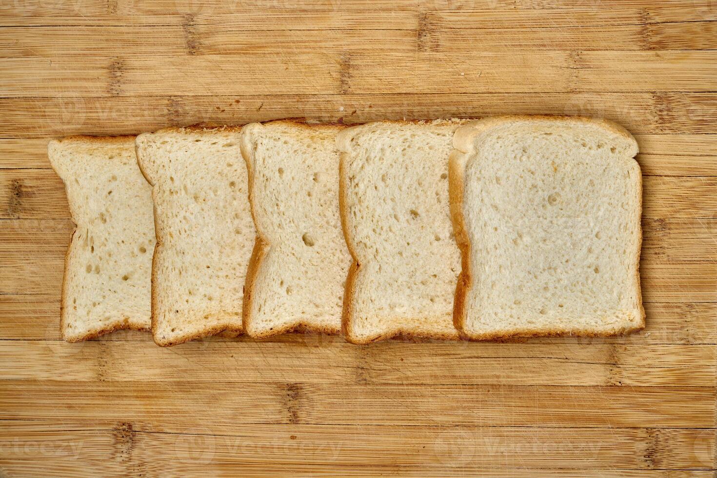 Slices of toast bread on a kitchen counter photo