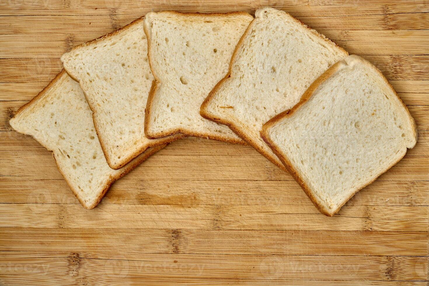 Slices of toast bread on a kitchen counter photo