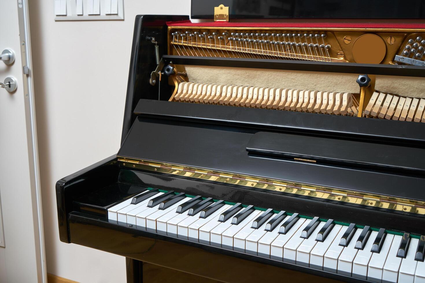 Black wall type piano photo