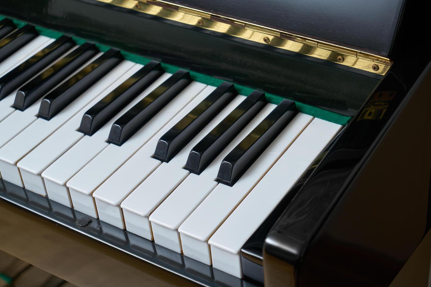 Black wall type piano photo