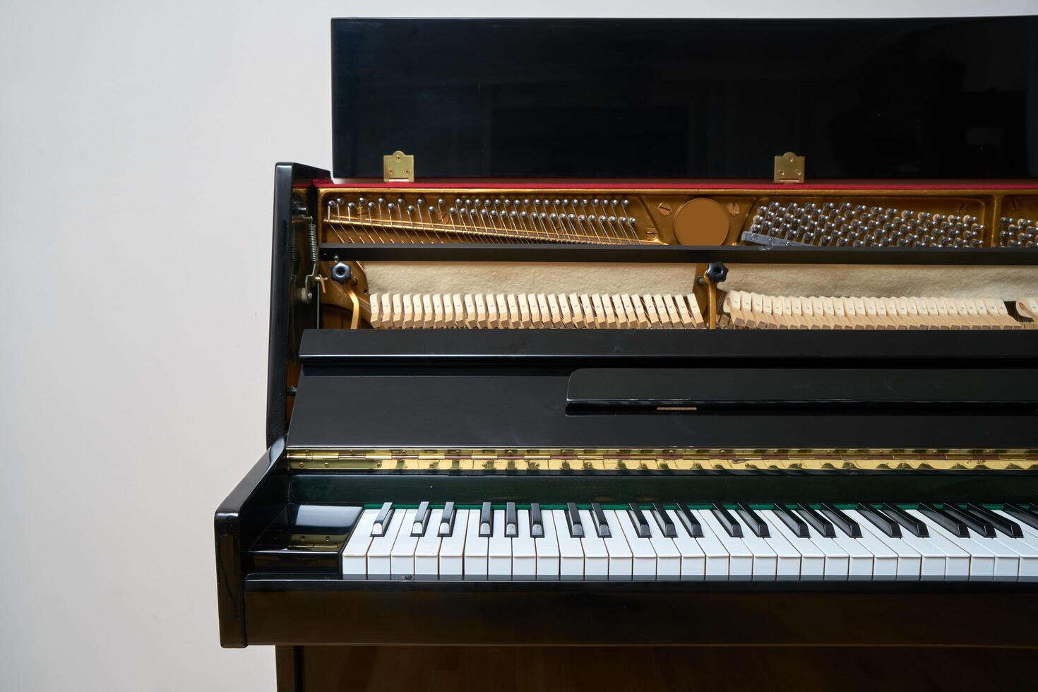 Black wall type piano photo