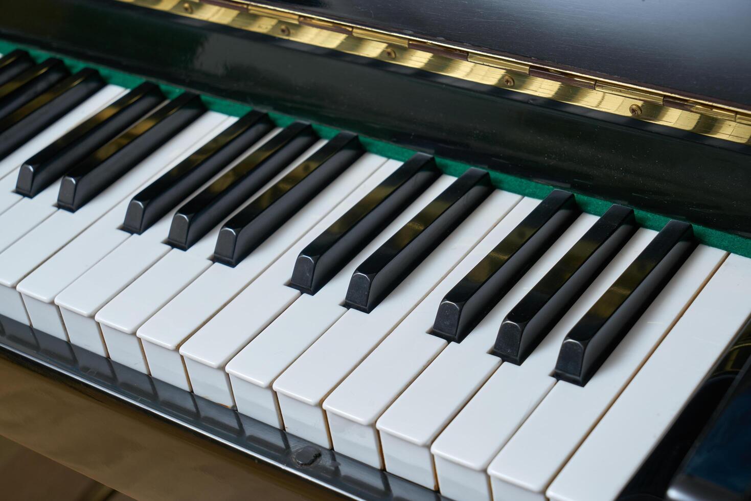 Black wall type piano photo