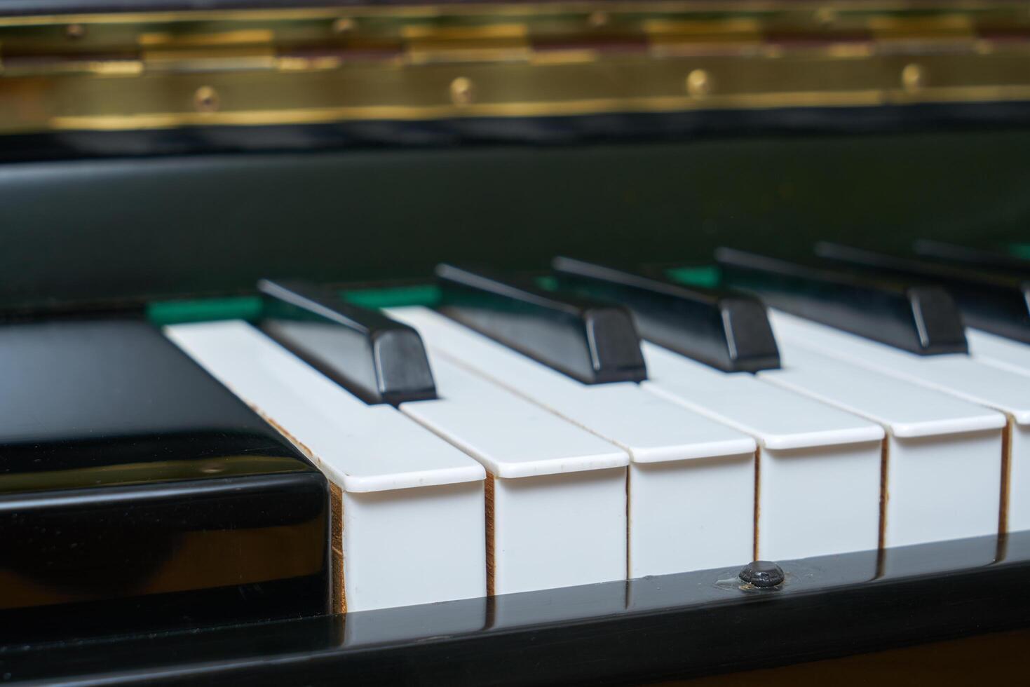 Black wall type piano photo