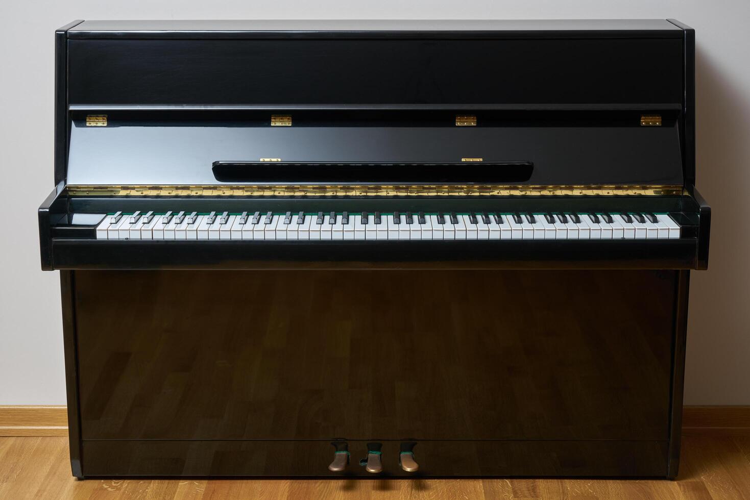 Black wall type piano photo
