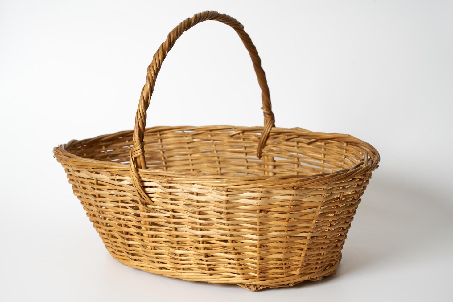 wicker basket on a white background photo
