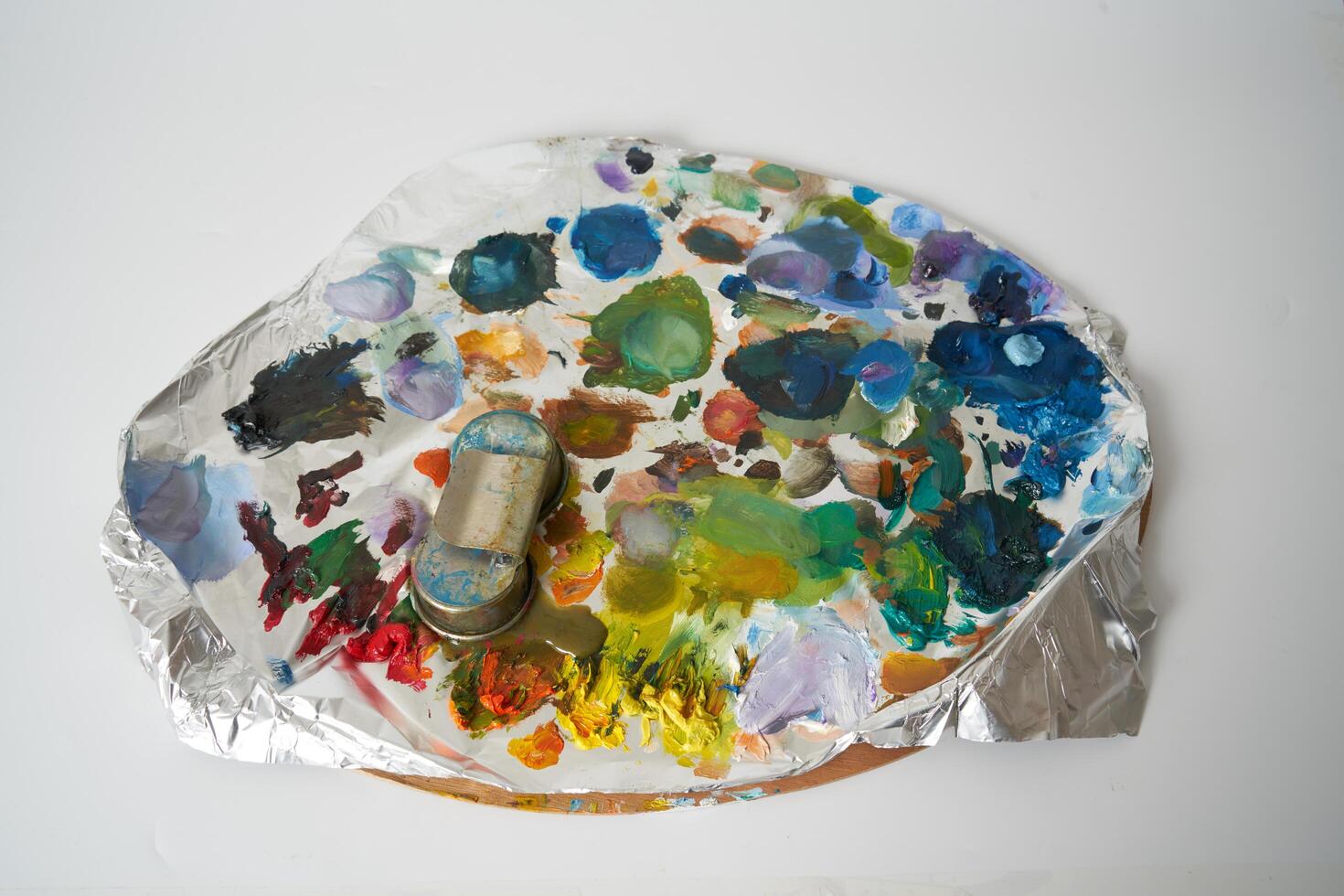 Oil paint on painters palette photo