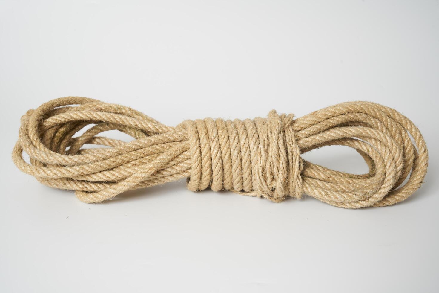brown rope on white background photo