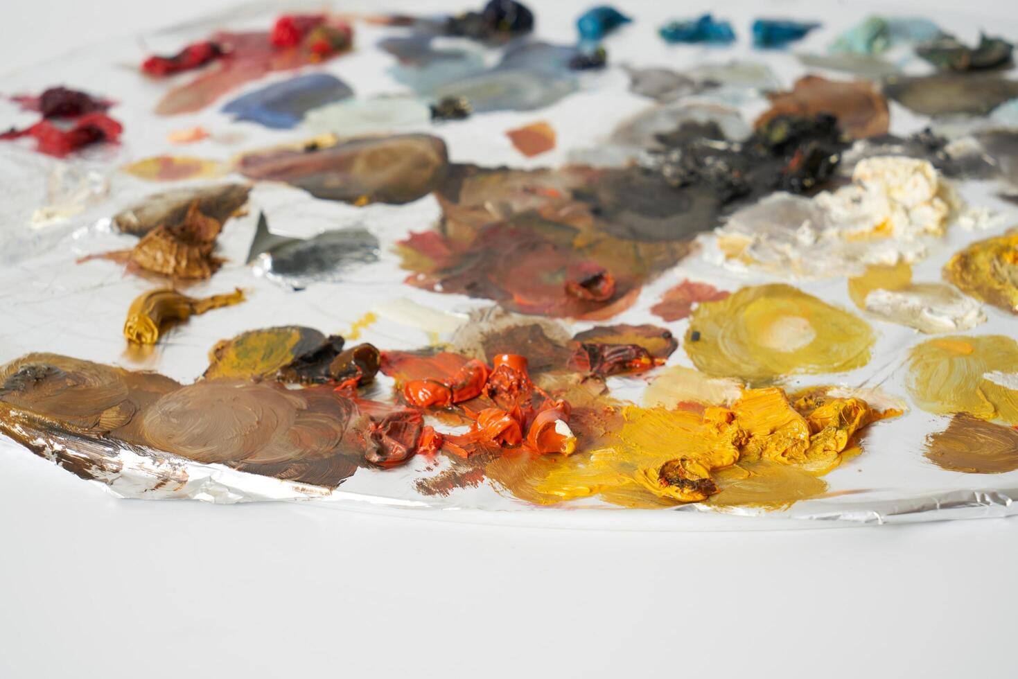 Oil paint on painters palette photo