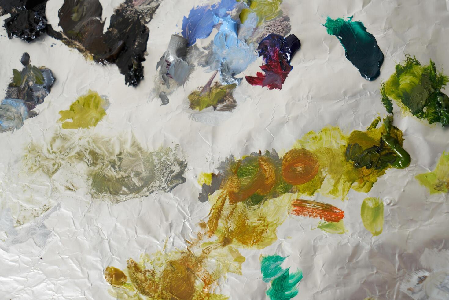 Oil paint on painters palette photo