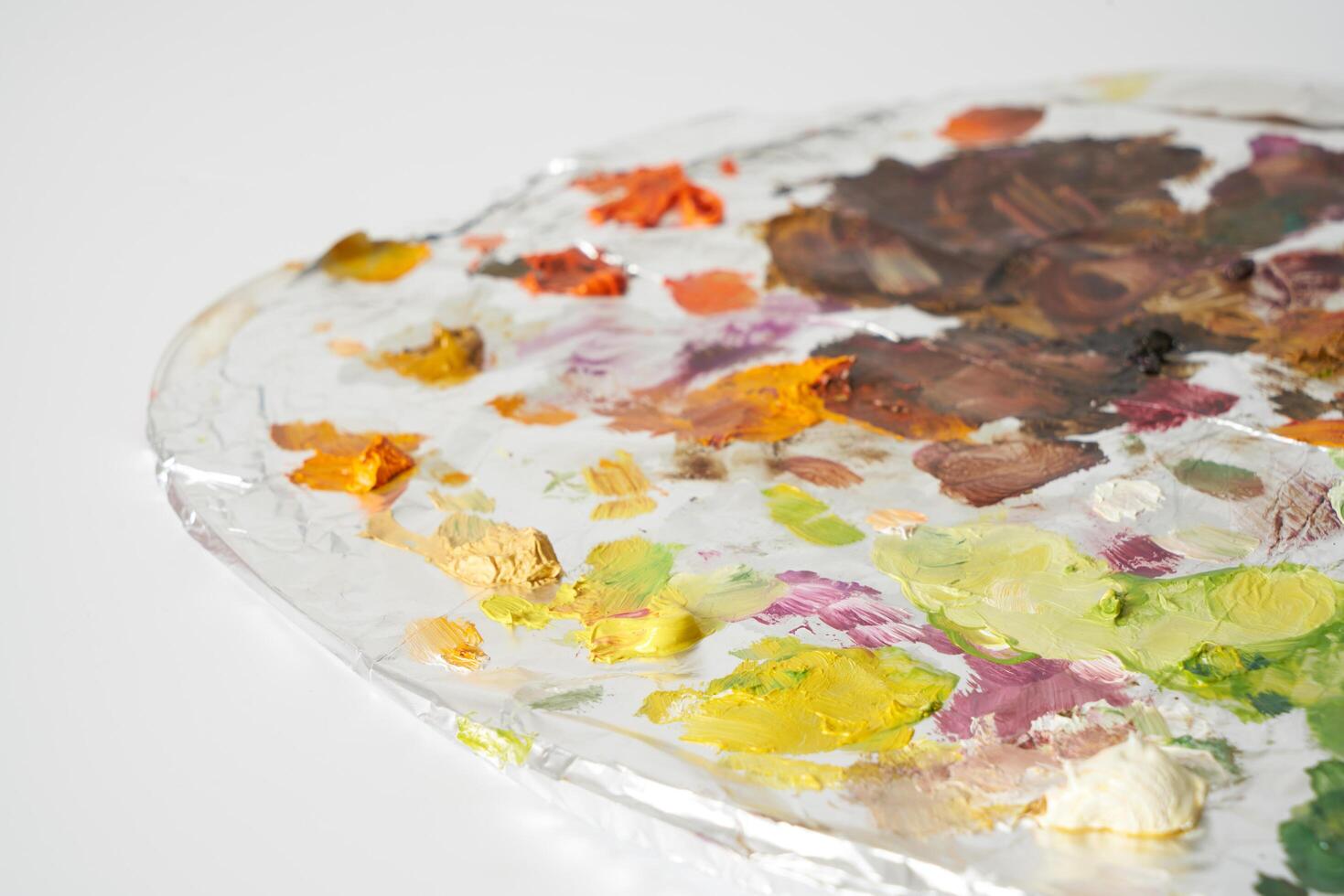 Oil paint on painters palette photo
