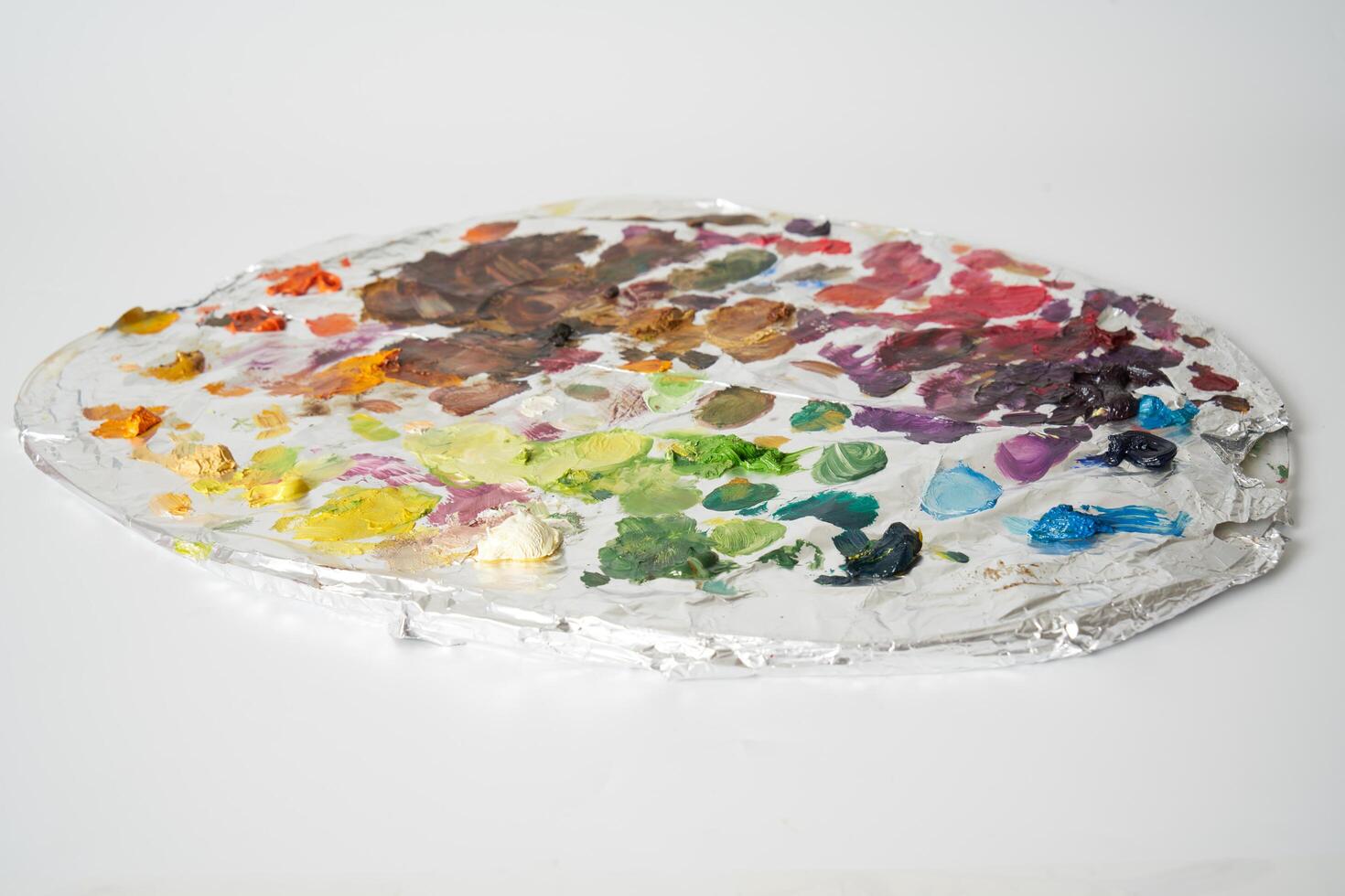 Oil paint on painters palette photo