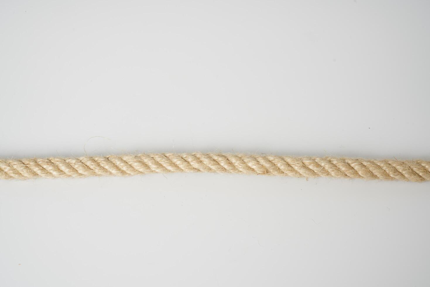 brown rope on white background photo